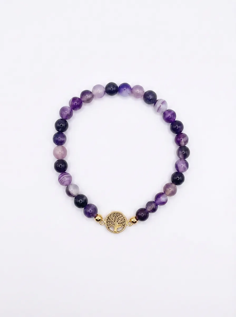 Pulsera de piedras moradas con el dije del Árbol de la Vida